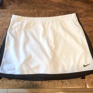 Nike skort.  White with black stripe.